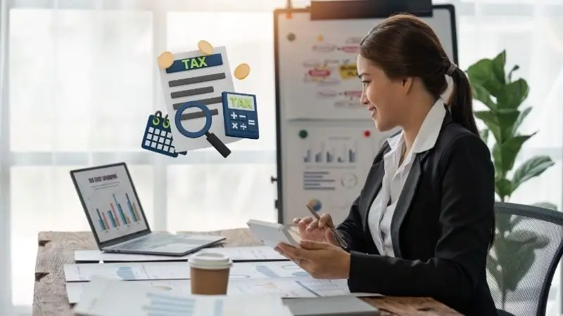 A Certified Public Accountant (CPA) working on her computer